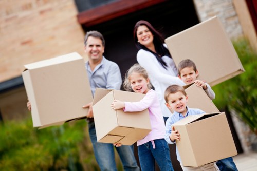 Student packing boxes prepared for storage in Merton