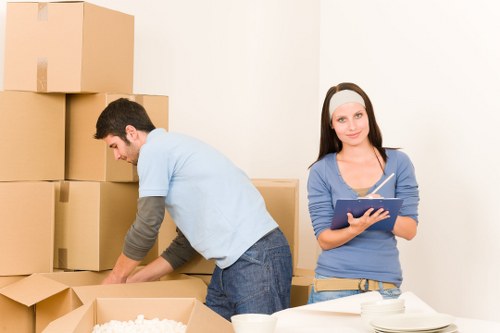 Family using furniture storage in Merton during a house move